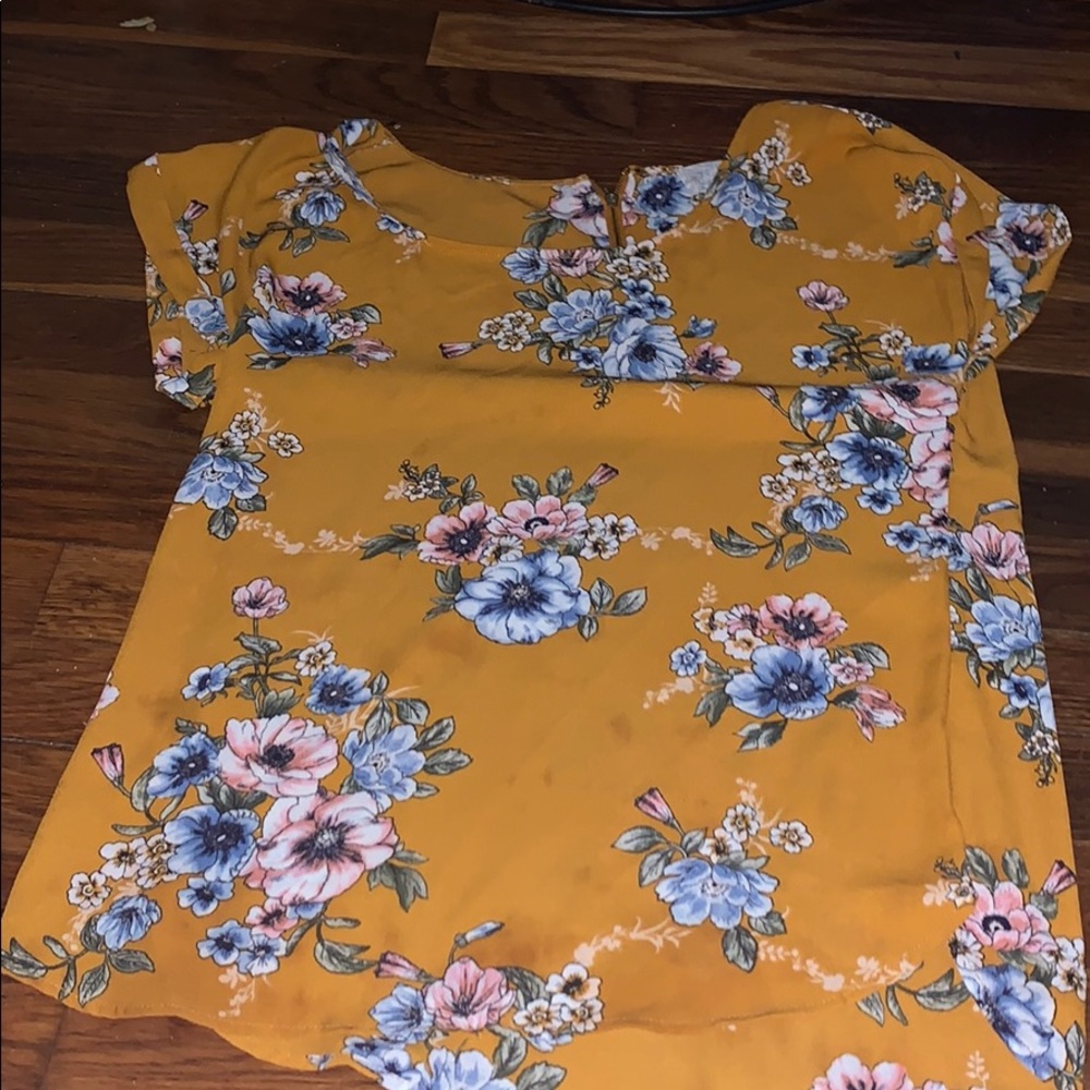 flower blouse with small tiny stain